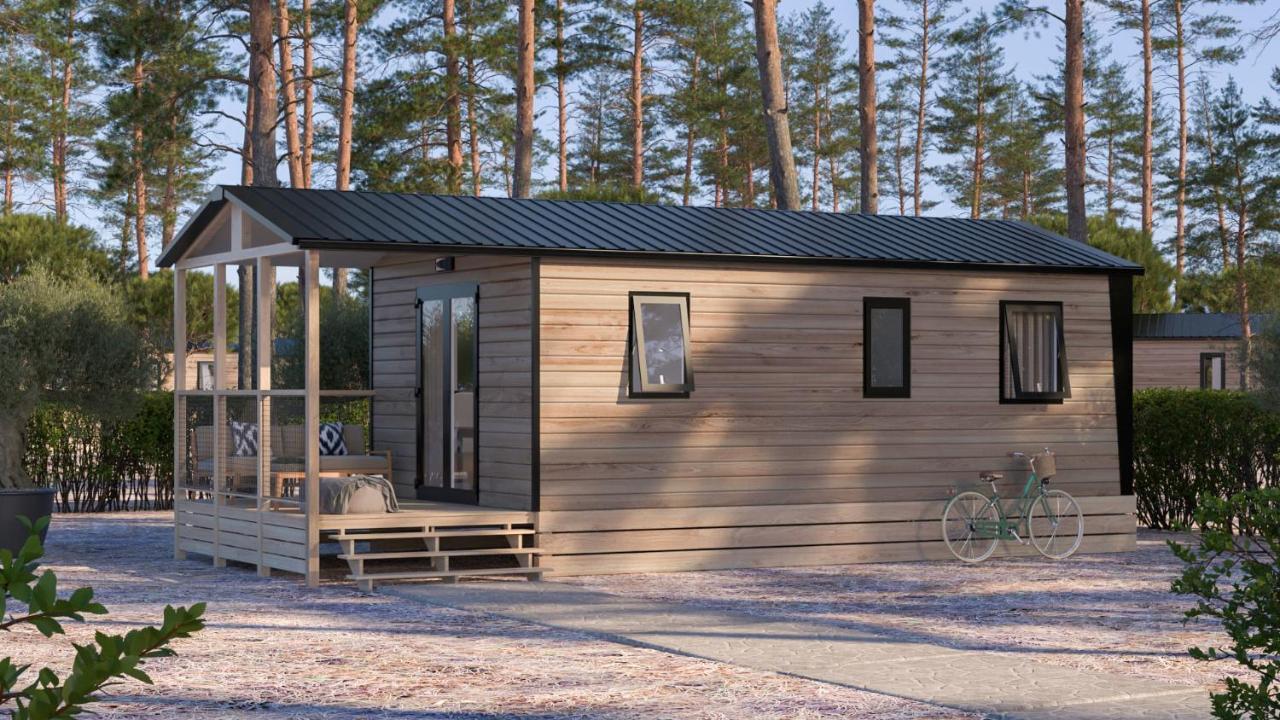 Village De Chalets Joyeuse Bagian luar foto